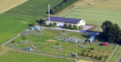 Aerial photo of the Giessen free-air CO2 enrichment (GiFACE) site. Starting from May 1998, three plots (E1-E3) receive CO2 at +20% above the ambient CO2 concentration for year-round during daylight hours. The three remaining plots serve as controls (A1-A3). Aerial photograph provided by Thomas Wißner (© 2013).